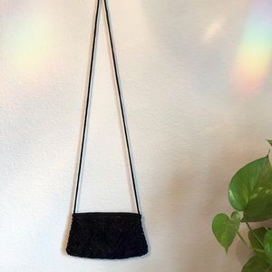 Vintage-inspired black beaded clutch